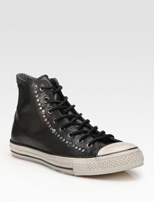 A classic Converse look in smooth leather with nailhead stud detail. Rubber toe cap Padded insole Rubber sole Imported 