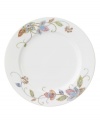 Well-crafted blooms create the illusion of texture on the sleek white porcelain of Oleg Cassini's Kavita dinner plate. A charming complement to the dinnerware collection.