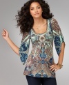 Rich prints overlap on One World's lovely tunic. Pair it with jeans, black pants or leggings for an easy anytime look!