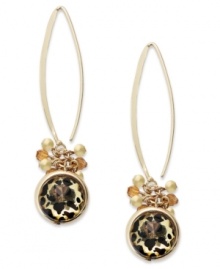 Get lovely in leopard. These eye-catching gold-tone earrings from Style&co. feature a topaz plastic bead center and fun charm accents. Approximate drop: 3 inches.