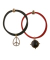 Decoratively detailed. Add pretty panache to your hairstyle with Lucky Brand's elastic hair bands. Featuring peace sign and crystal charms, they're made in plastic and set in gold tone mixed metal. Approximate diameter: 1-3/4 inches. Approximate drop: 1 inch.