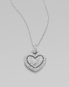 EXCLUSIVELY AT SAKS. A double sided heart pendant set in a crystal pavé.Crystal Rhodium plated Length, about 16 with 2 extender Lobster clasp closure Imported 