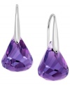 Amazing amethysts. Purple reigns in this pair of drop earrings from Swarovski. Crafted from rhodium-plated mixed metal and featuring stunning amethysts offset with crystal accents, this set is a thing of beauty. Approximate drop: 1-1/10 inches.