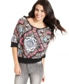 Rock this three-quarter sleeve scarf-print top from Belle Du Jour for a look that's trend-right and full of spirit!