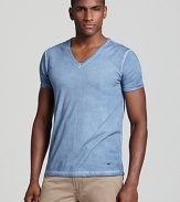 Update your basics with a fashionably worn-in light blue tee from BOSS Orange.