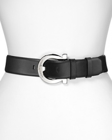 Trimmed in striking silver hardware, Salvatore Ferragamo's black leather belt adds sleek definition to your waist.