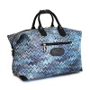 A gorgeous Missoni design adorns this beautiful duffel from Bric's.