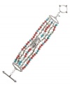 Beautifully beaded. A chic combination of coral and turquoise adds summery style to this Lucky Brand bracelet. Made in silver tone mixed metal (and nickel-free for sensitive skin) with both semiprecious and plastic beading, it includes a toggle closure. Approximate length: 7-5/8 inches.