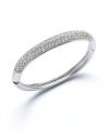 Sparkling, stackable style! Pair this party-perfect bangle with others for a chic, layered look, or wear it alone to make a solitary statement. Charter Club's stylish bangle creates the perfect amount of shine with glittering, pave-set glass accents. Crafted in silver tone mixed metal. Approximate diameter: 2-1/4 inches.