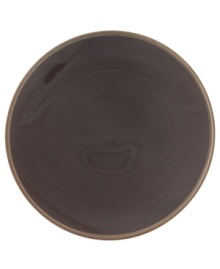 Rich chocolate hues and a dashing coupe shape give this collection from Calvin Klein undeniably chic style. The Tonal Edge dinnerware features lush brown glaze over fine porcelain with a matte bisque rim to create a duality of color.