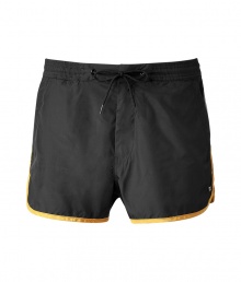 Stylish black swim shorts from beloved NYC-designer Marc Jacobs are a summer must-have - Features cool, yellow accent piping for a retro-free - Fashionable boxer-cut is straight with a moderately-wide leg for a short-but-not-too-short look - Practical pockets and a drawstring waist - The perfect companion for beach and pool