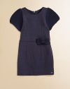 A chic dress for little ones with sweater detailing and a gorgeous silhouette.CrewneckConcealed back zip closureSweater-knit cap sleevesWaistband with sweater bow detailWaist dartsFour-panel skirtBody: 71% polyester/27% viscose/2% elastaneSleeves and bow: 52% cotton/48% acrylicMachine washImported