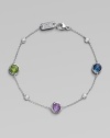 From the Silver Rain Collection. Delicate diamonds and faceted peridot, London blue topaz and dark amethyst sparkle from a delicate sterling silver chain.Diamonds, .15 tcw Peridot London blue topaz Dark amethyst Sterling silver Length, about 7 Lobster clasp closure Imported