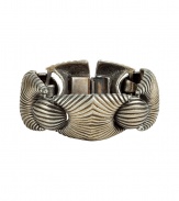 With a stylish tribal-inspired motif, this boho-chic bracelet from Ben-Amun is a new season must-have - Hinge closure, interlocking circular detailing, all-over strip pattern - Pair with denim cut offs, a billowy blouse, and fringe-detailed ankle boots