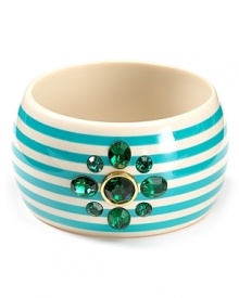 Flash your style credentials in Juicy Couture's oversized enamel bangle. With chunky stripes and shimmering gems, this bracelet is prep cool.