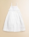 This angelic A-line silhouette is topped with pintucked and embroidered details.SquareneckSpaghetti strapsBack buttonsFull skirtCottonMachine washImported Please note: Number of buttons may vary depending on size ordered. 