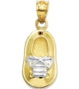 Commemorate your brand new bouncing baby boy. This precious charm features a baby shoe in 14k gold with rhodium laces. Chain not included. Approximate length: 1 inch. Approximate width: 2/5 inch.