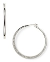 MICHAEL Michael Kors' pavé -encrusted hoops are a versatile daytime detail. Pay attention to the finer points and wear these to add polish to sharp tailoring and sleek suiting.