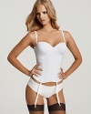 For your special day, put your trust in this soft, seamless bustier. In super soft, molded microfiber. It fits over the hips for the smoothest body line. Removable garter straps. Perfect under any bridal gown. Low back, hidden stays and hidden wires. With 2 styles of removable straps for versatility. Convertible straps.