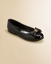 Poised and polished patent leather flats have a pretty front bow, accented with a golden signature tab.Patent leather upperSynthetic solePadded insoleImported