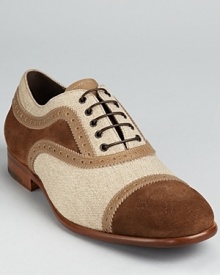 Salvatore Ferragamo mixes panels of suede, leather and canvas to striking effect in the Basilea oxford.