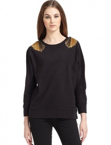 THE LOOKCrewneckWing-inspired metal beadwork adorn the shoulders and back¾ dolman sleeves with banded cuffsBanded hemTHE FITAbout 24 from shoulder to hemTHE MATERIAL50% wool/50% acrylicCARE & ORIGINDry cleanImported