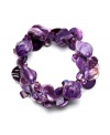 Add sweet, summery flair to any look in this fashionable Style&co. bracelet. Crafted from natural shells and glass accents in vibrant purple hues. Bracelet stretches to fit wrist. Approximate diameter: 2-1/4 inches.