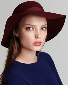 Transition your favorite summer look into a cozy cold weather style with a wide brim felt floppy from Aqua.