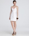 An opulently beaded neckline punctuates this vintage-inspired yet sleekly modern Shoshanna dress.