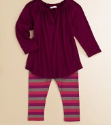 This charming pair features a playful tunic with a pretty pleated collar and stripey matching leggings. Tunic Split collarLong sleevesCurved hem Leggings Elasticized waistbandPull-on style96% rayon/4% spandexMachine washImported