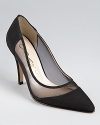 Mesh sides show some skin on Caparros' pointed toe Anastasia pumps, a classic style with an alluring, modern update.