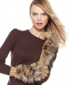 Feel fabulously warm in these chic MICHAEL Michael Kors knit gloves that are elegantly accented with faux fur.