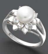 Floral elegance. A polished cultured freshwater pearl (7-1/2-8 mm) surrounded by round-cut white topaz (5/8 ct. t.w.) creates a look inspired by nature. Set in sterling silver. Size 7.