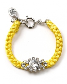 A bold take on this season's homespun trend, this fluoro woven bracelet from Juicy Couture is bright on.