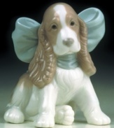 Take man's best friend home--in the form of this adorable sculpted puppy.