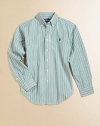 A crisp long-sleeved button-down is rendered in smart, versatile striped cotton.Button-down collarLong sleeves with single-button barrel cuffsButton-frontSplit back yokeShirttail hemCottonMachine washImported Please note: Number of buttons may vary depending on size ordered. 