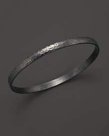 This textured 24K gold and dark silver bracelet makes a subtle, sophisticated statement.