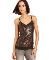 Allover sequins make this GUESS tank a glam pick for adding high-shine style to your ensemble!