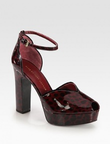 A sexy platform silhouette of spotted patent leather with an adjustable ankle strap and contrast trim. Self-covered heel, 4½ (115mm)Covered platform, 1¼ (30mm)Compares to a 3¼ heel (80mm)Patent leather upperAdjustable ankle strapPeep toeLeather lining and solePadded insoleImportedThis style runs true to size. We recommend ordering your usual size for a standard fit. 