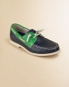 A preppy variation on the boat shoe theme in a fresh plaid fabric with leather lining and trim.Fabric upperLeather lacing at collar and across frontLeather liningPadded insoleEVA soleNike Air technologyImported