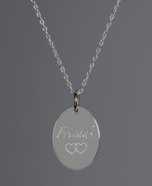 The perfect gift for your favorite mate. This oval-shaped pendant features the word Friends engraved on the surface with a double heart accent. Crafted in sterling silver. Approximate length: 18 inches. Approximate drop: 3/4 inch.