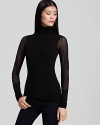 Sheer sleeves add allure to this Bailey 44 turtleneck top.