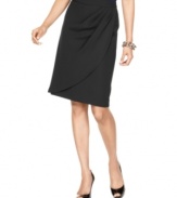 Add a side-swept look to your work ensemble with this skirt, featuring a wrap-like look that pairs perfectly with other pieces from Nine West's collection of suiting separates.