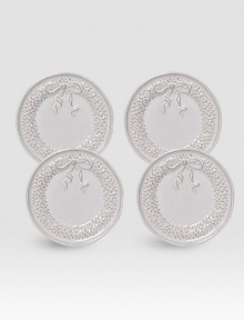 A gift-boxed set of delightful ceramic plates are handcrafted with intricate wreath detail, ideal for holiday giving or entertaining. Set of 4 Arrives in a gift box Each, 6½ diam. Dishwasher safe Imported 