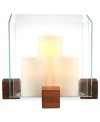 Sheer brilliance. Three candles contained within a block of glass and raised on blocks of wood add modern intrigue to your patio or picnic table. From Dansk.