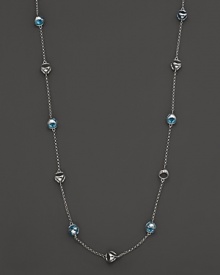 This bold sterling silver lstation necklace gleaming with blue quartz, is a brilliant showcase for Di MODOLO's iconic Triadra design.