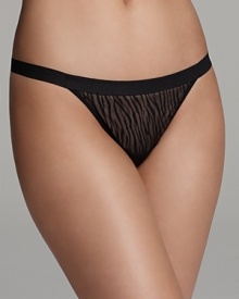 A sleek and stylish thong in an alluring semi-sheer animal print from OnGossamer.