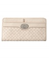 A timeless style featuring clean lines and a refined woven design, perfectly accented with vintage-chic hardware. This gorgeous clutch from Fossil is perfect for both day or night.