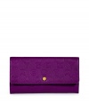 Detailed in bright purple logo imprinted leather, Marc by Marc Jacobs tri-fold wallet is a fun and covetable choice for stashing away your everyday essentials - Front logo snap, back slot pocket, zippered change purse, multiple credit card slots - Carry alone for running quick errands, or slip into a brightly printed handbag