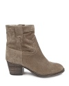 Meet the new western boots. Short, chic and perched on a stacked heel, these suede booties are style stars. By STEVE MADDEN.